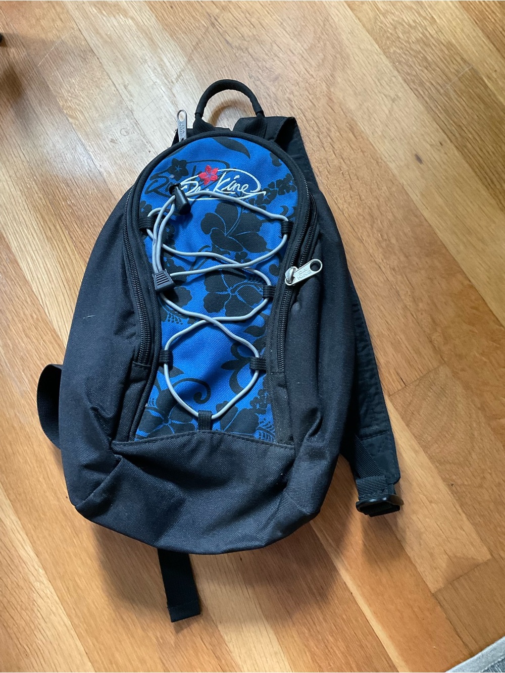 Dakine Blue and Black Sling Backpack with Front Bungee